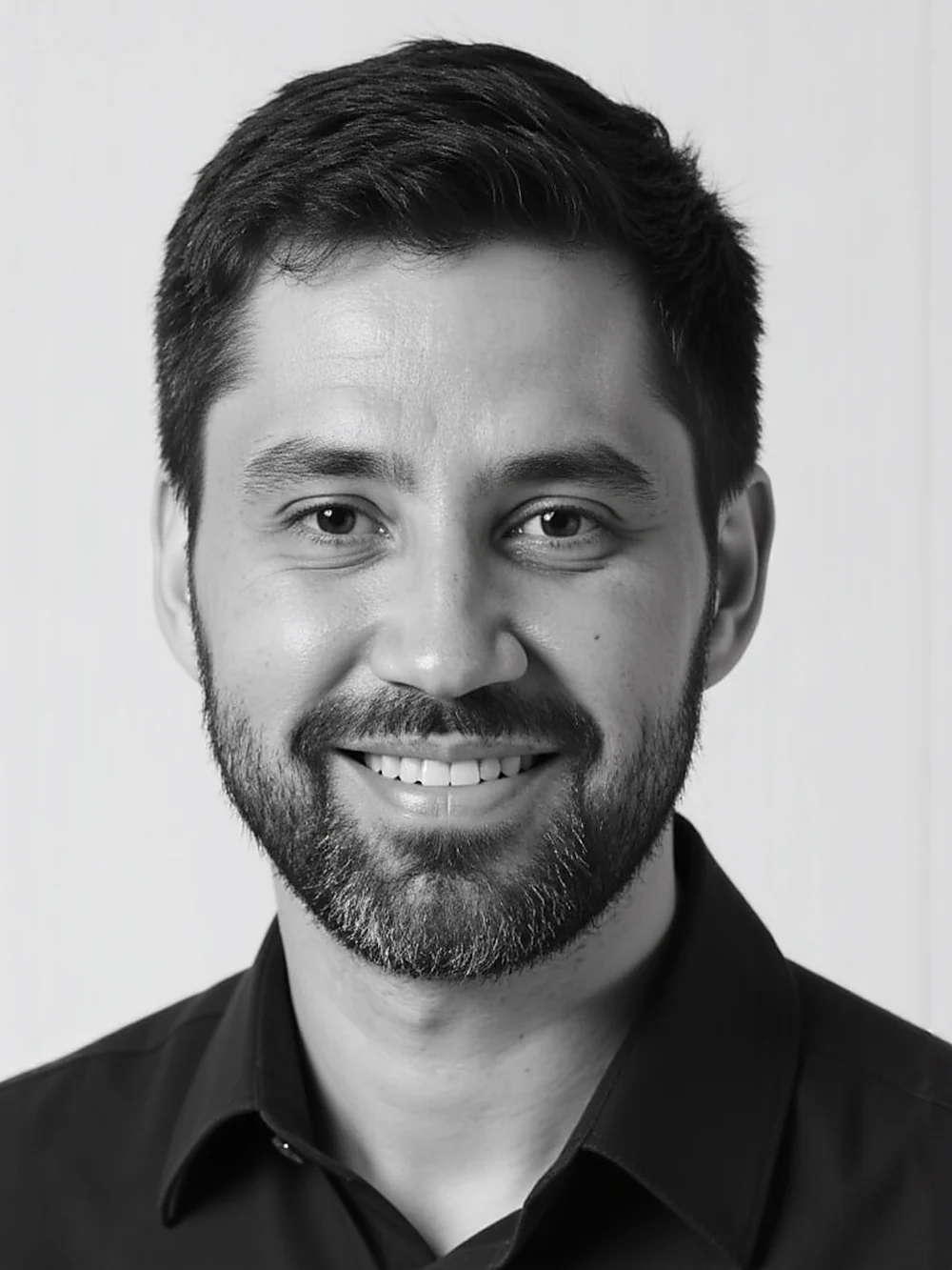 Black and white portrait of Dr. Ren Silva.